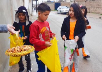 Roja yekem a Cejna Remezanê li Qamişlo.