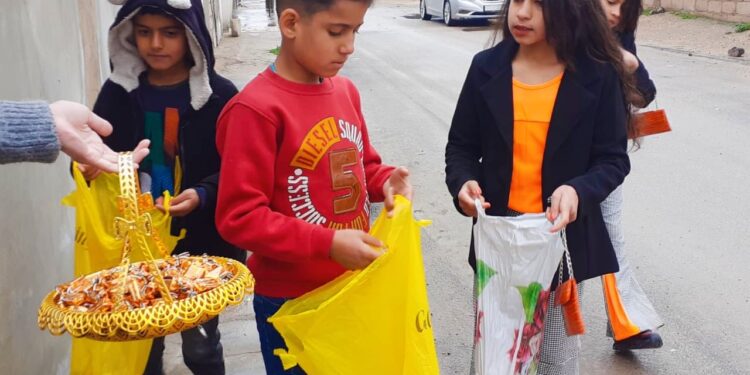 Roja yekem a Cejna Remezanê li Qamişlo.